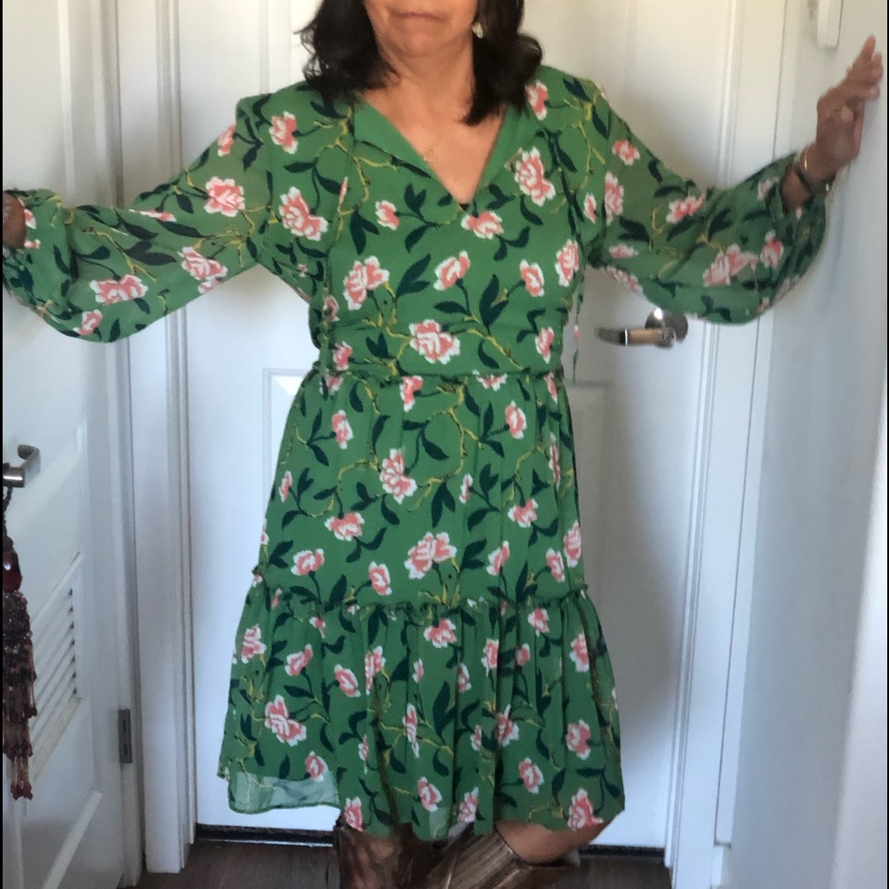 This dress it’s beautiful, fits a size 14 easy to wear with boots and heels.